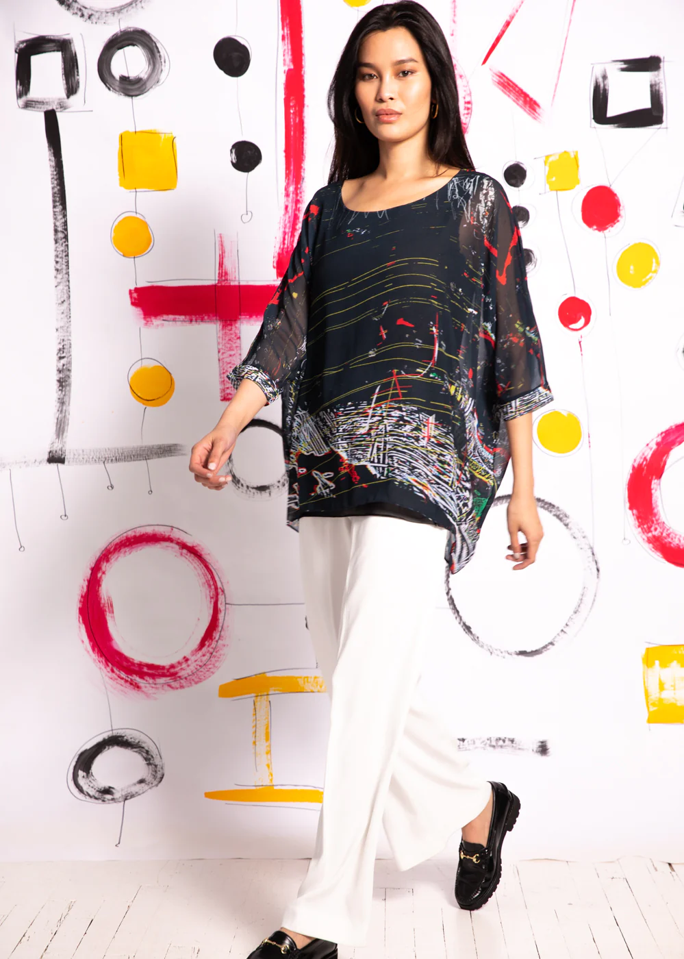 92839capri-poncho-in-interruption.webp